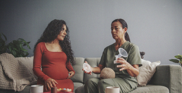 private practice lactation consultant at an in-home consultation with an expecting mother